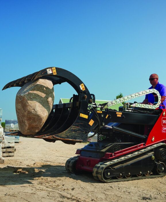 toro with grapple and rock